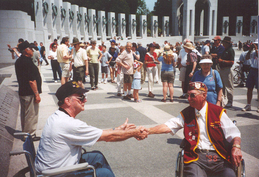 DAD ON LEFT SHAKING HANDS AT THE WWII memorial2