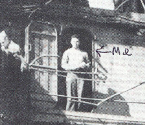 Dave Kelley zoomed in at doorway after Kamikaze attack on Tocondiroga Air Craft Carrier January 21 1945